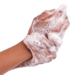 washing hands with antibacterial soap