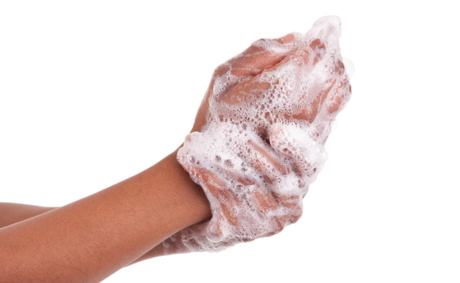 washing hands with antibacterial soap